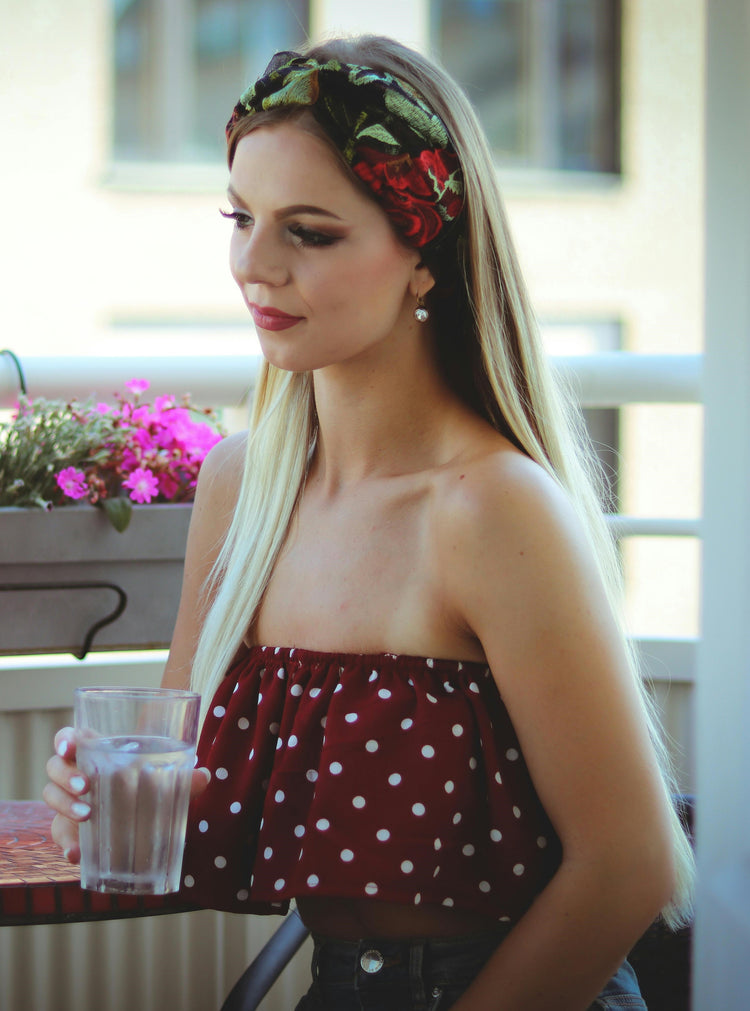 Young Woman Wearing Floral Headband