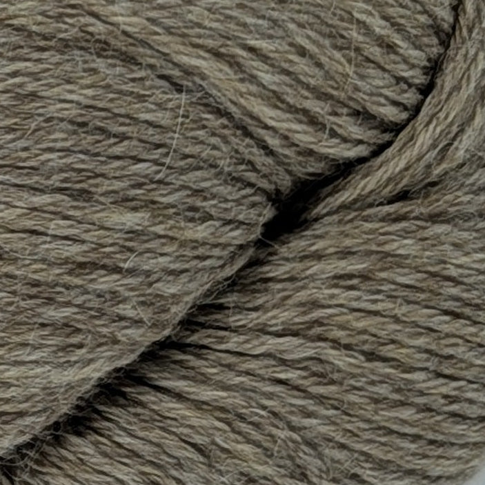 Ball of yarn with a label on a white background