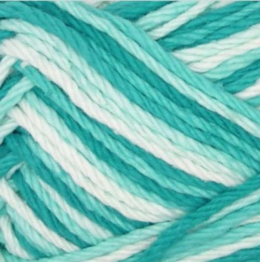 Close-up of teal and white yarn strands