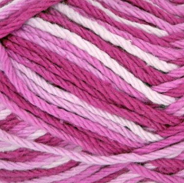 Close-up of pink and white yarn strands