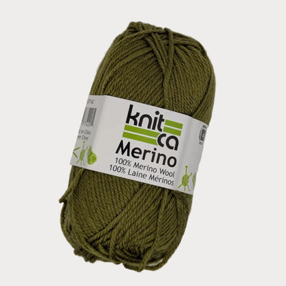 Ball of green yarn with a 'Knit Co Merino' label on a light gray background