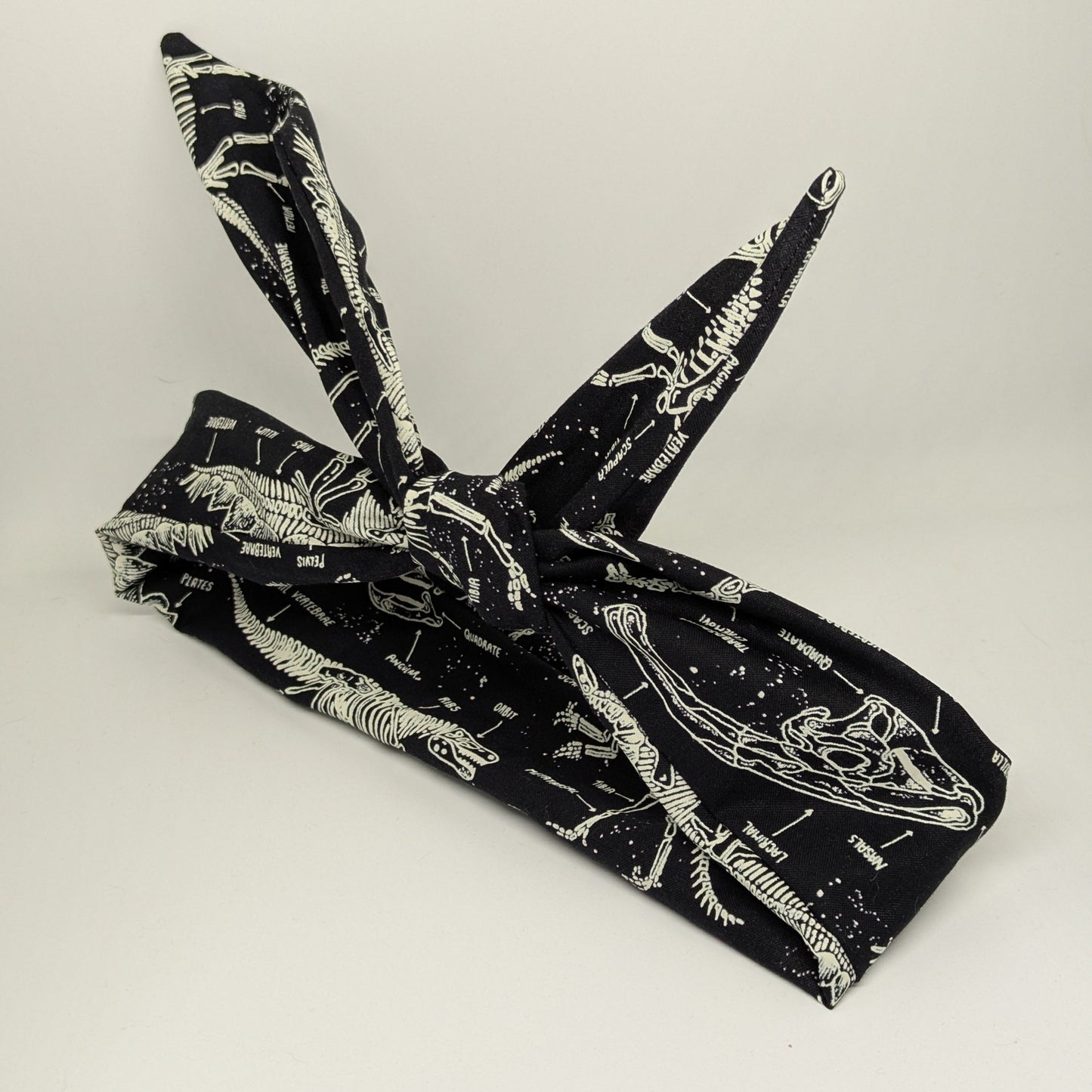 Fossil Retro Wire Headband | Glow-in-the-Dark Dinosaur Skeletons - Alpine Kneedles