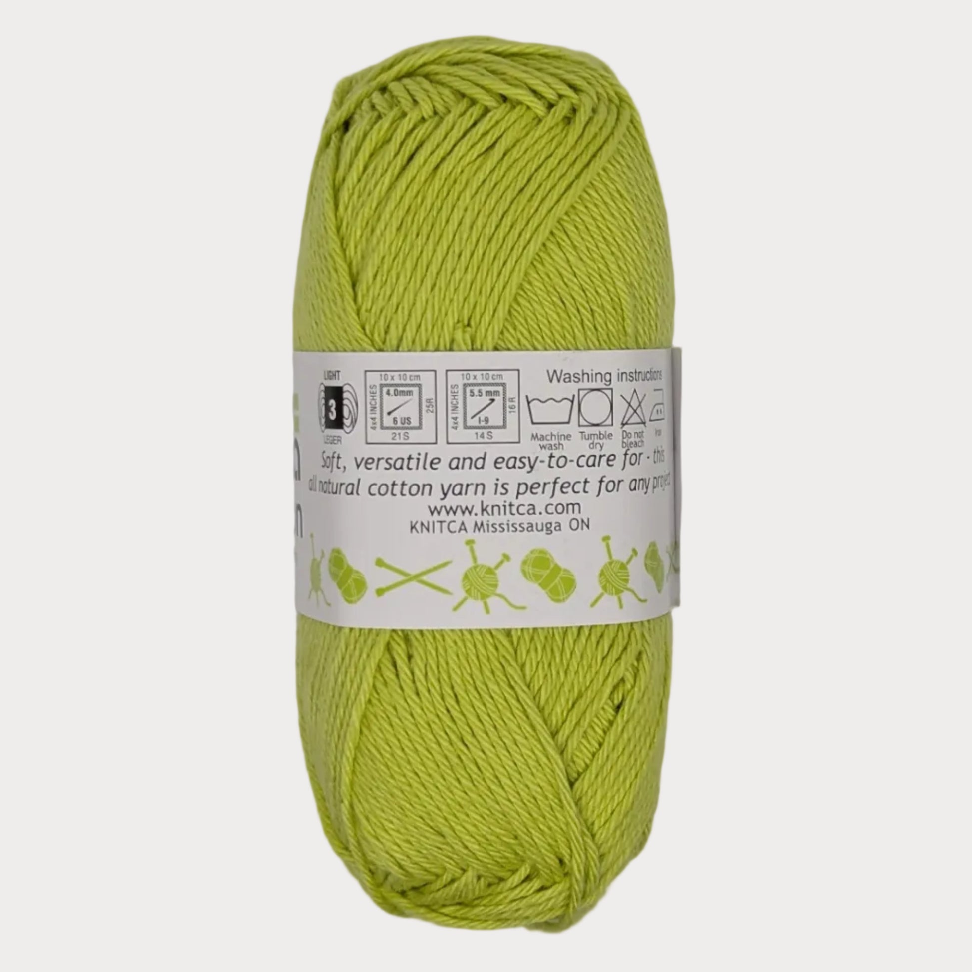Lime green skein of yarn with a label on a light gray background