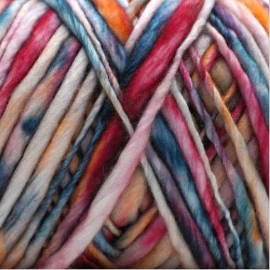 Close-up of variegated yarn strands in a multicolor blend of pink, blue, orange, beige, and purple.