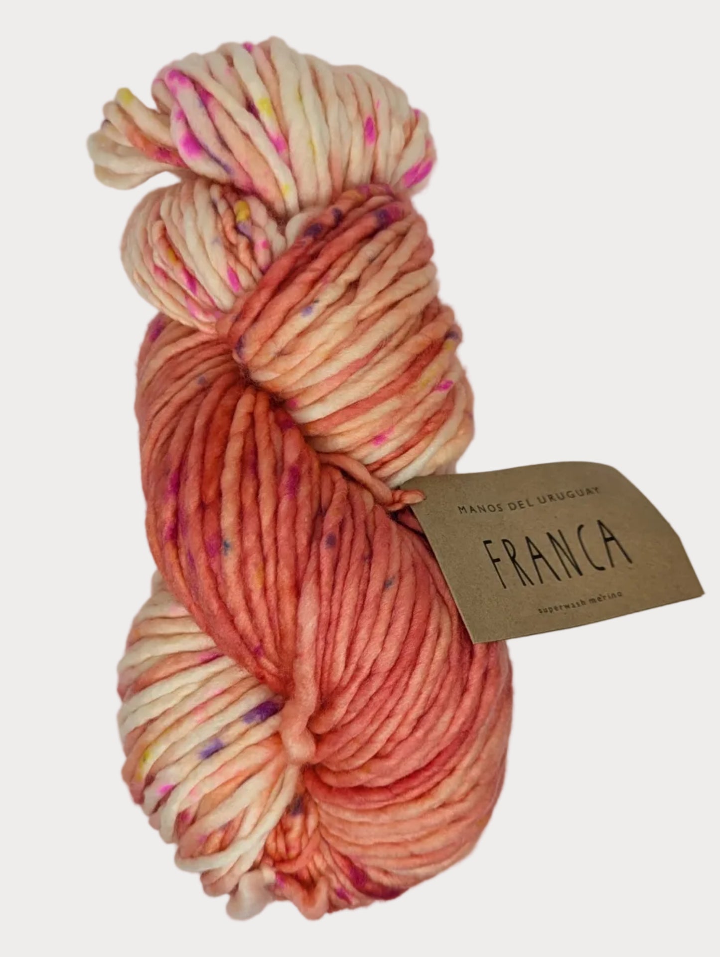 Multicolored skein of yarn with a 'Franca' label on a white background