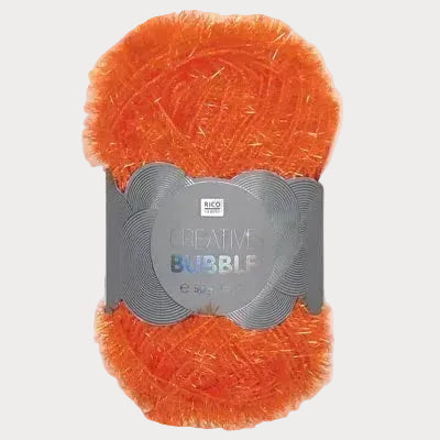Orange bubble yarn with a label on a white background
