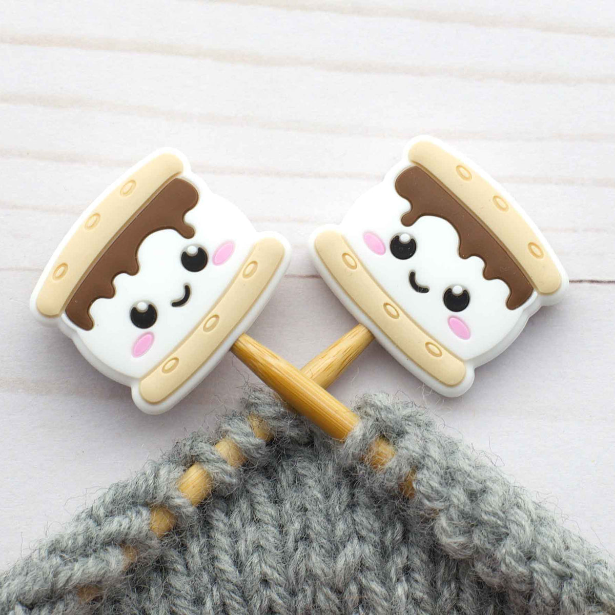 S'mores stitch stoppers on knitting needles
