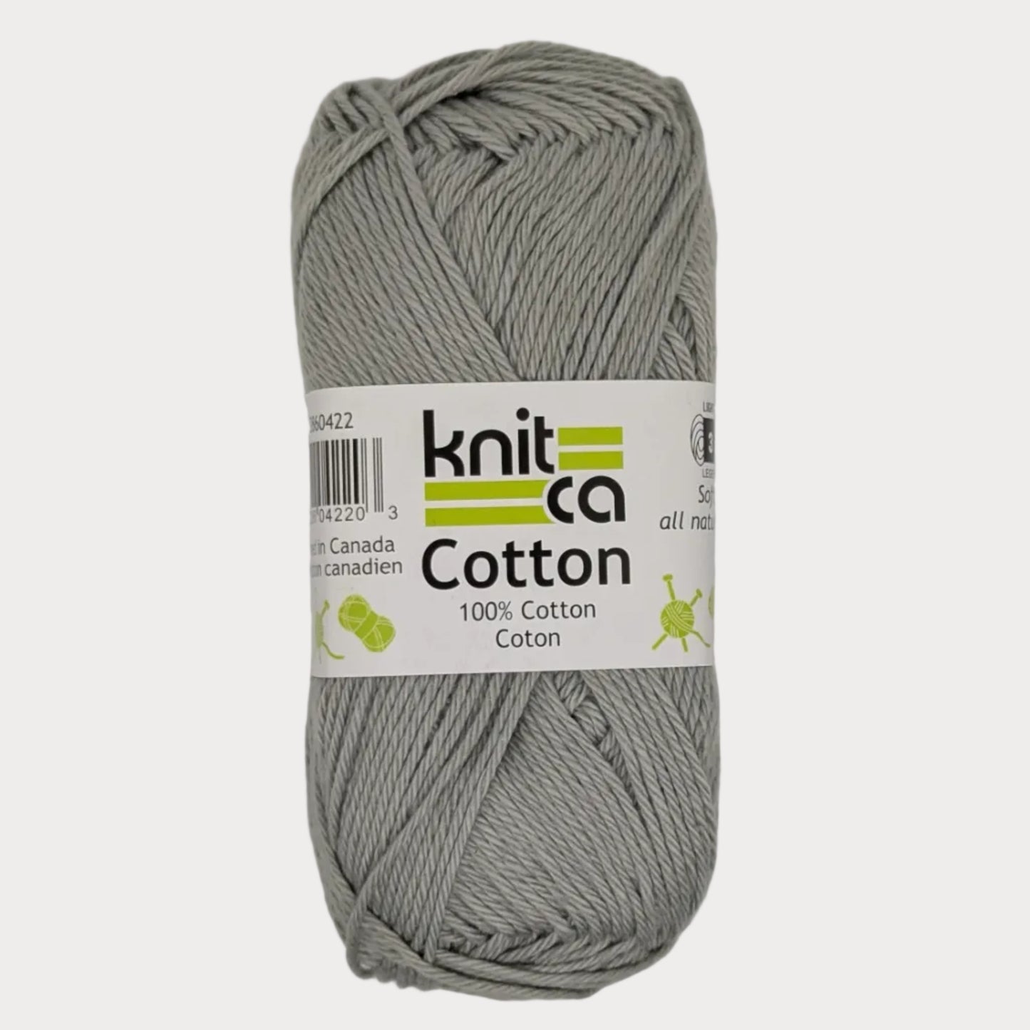 Gray skein of yarn with a 'Knit Cotton' label on a light gray background