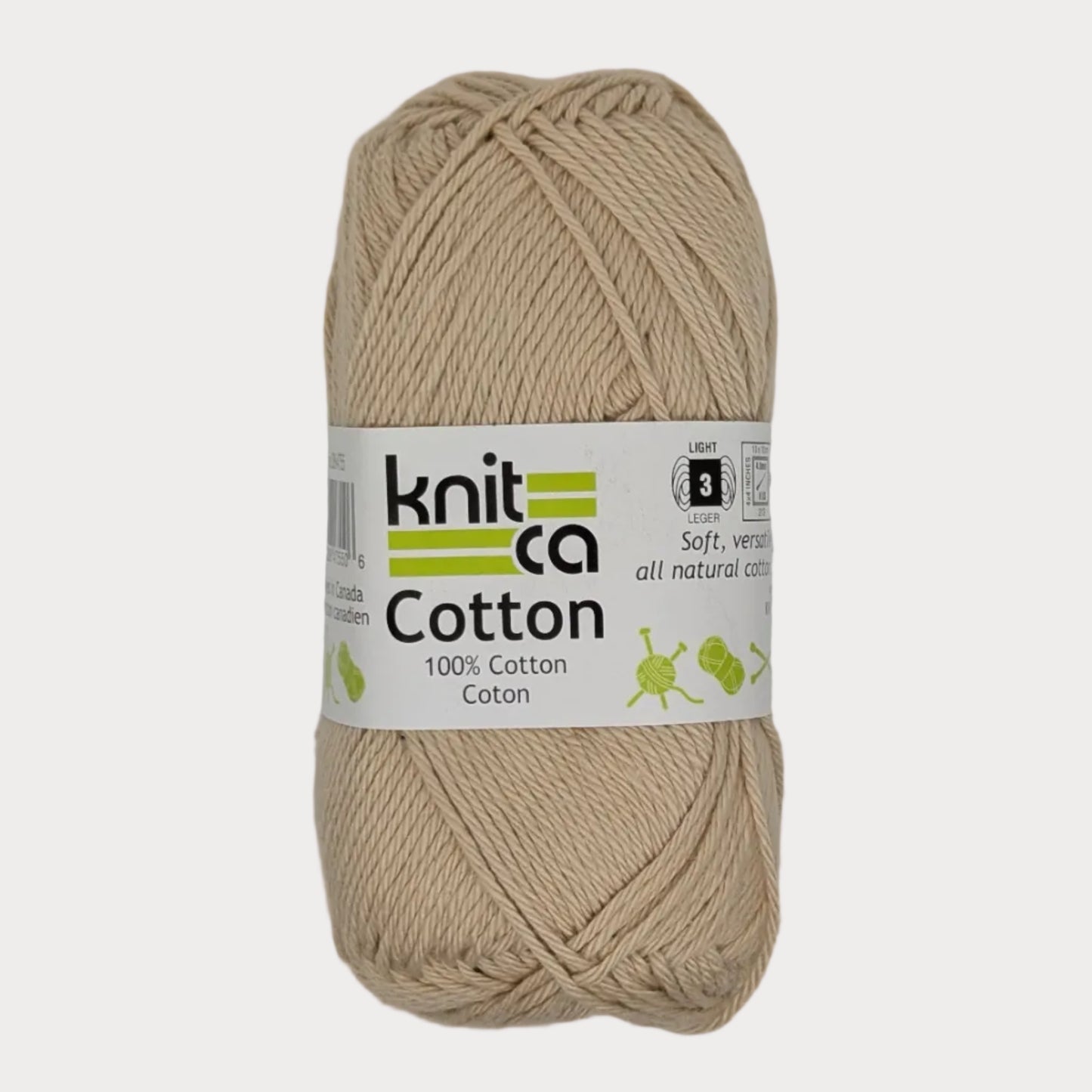 Ball of beige yarn with a 'Knitca' label on a light gray background