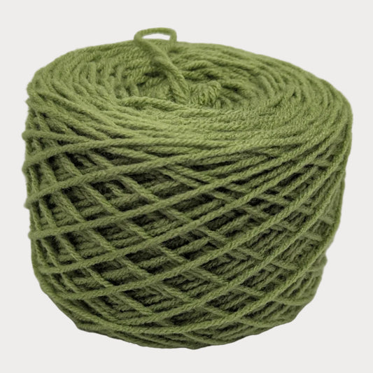 Green skein of yarn on a white background