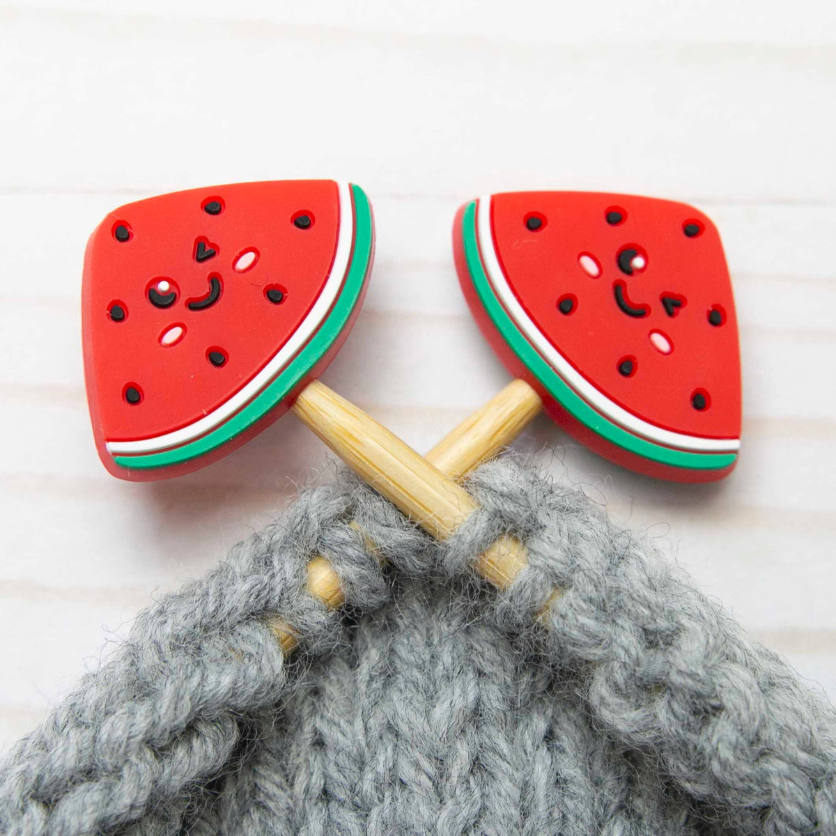 Watermelon stitch stopper on knitting needles
