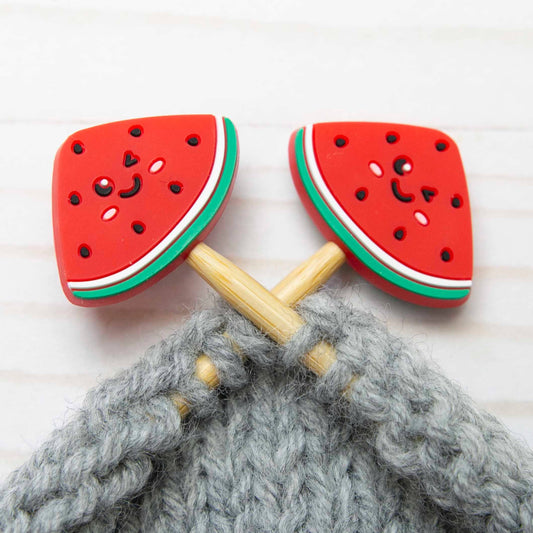Watermelon stitch stopper on knitting needles