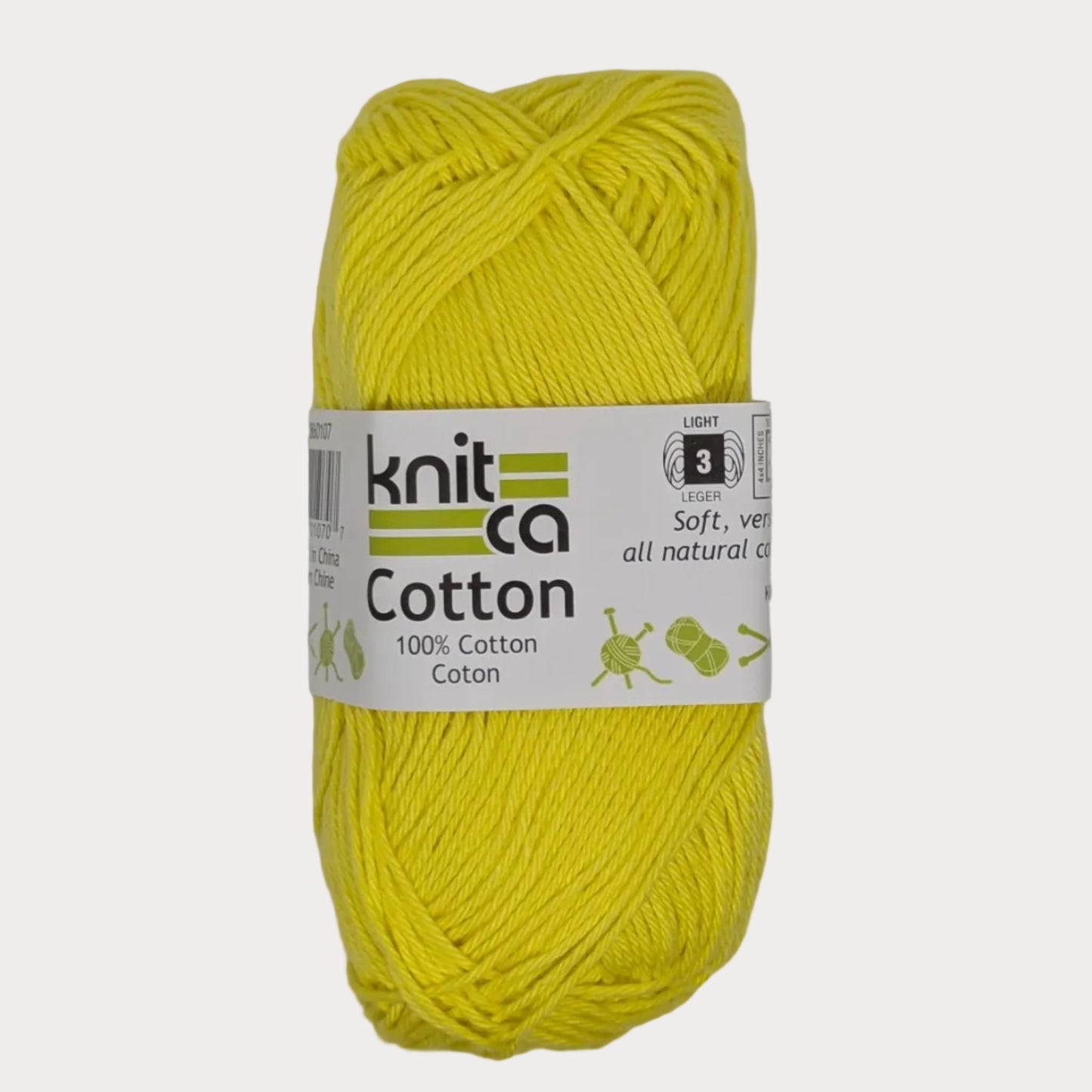 Yellow ball of yarn with a 'Knitca' label on a white background