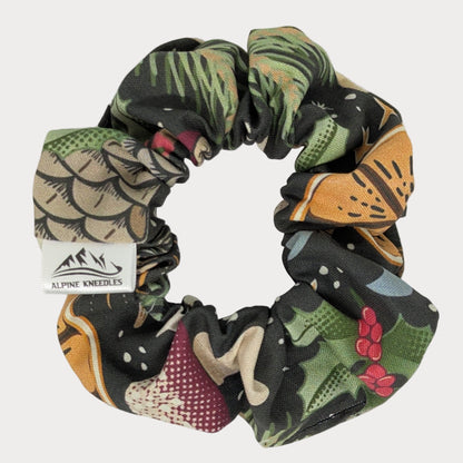 Multicolored scrunchie with a label on a white background