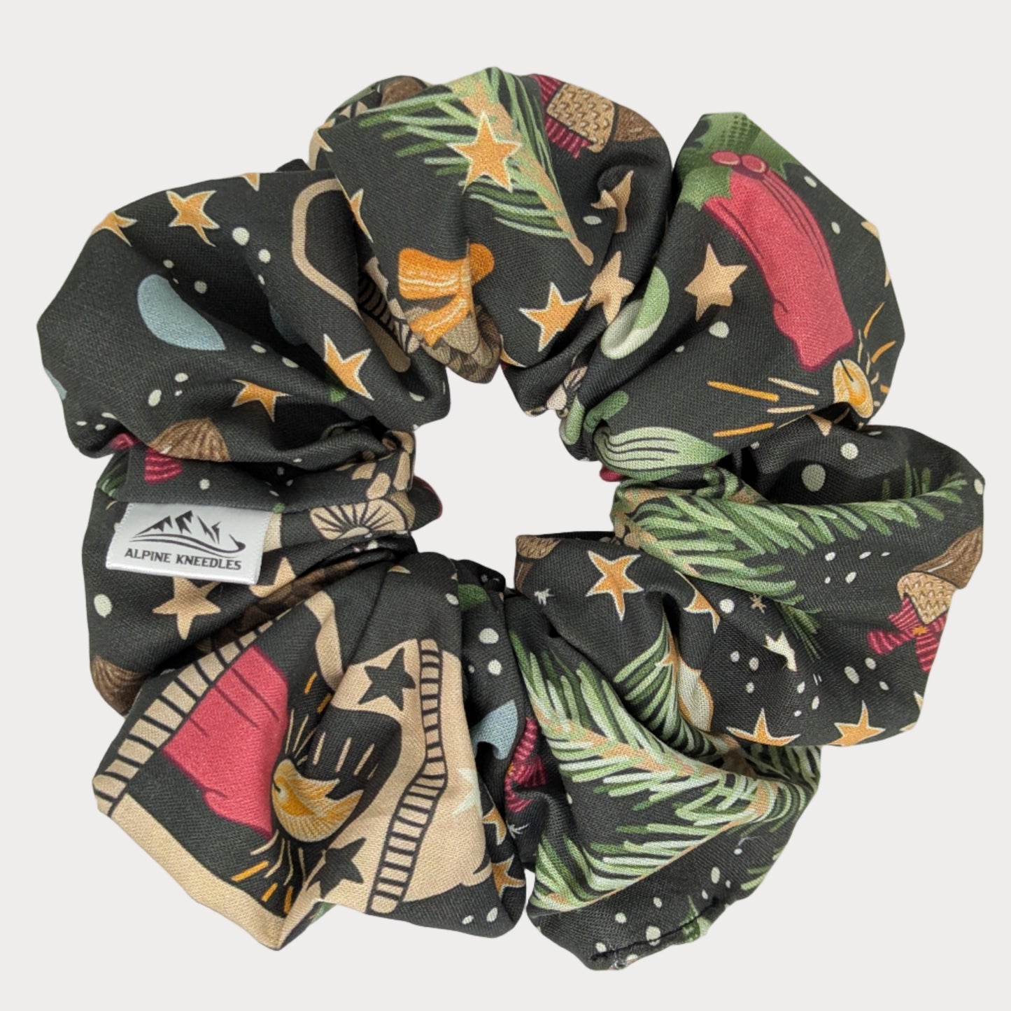 Decorative scrunchie with colorful patterns on a white background