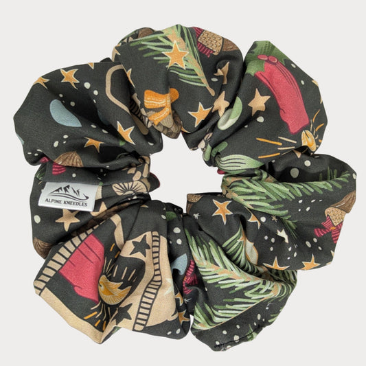 Decorative scrunchie with colorful patterns on a white background