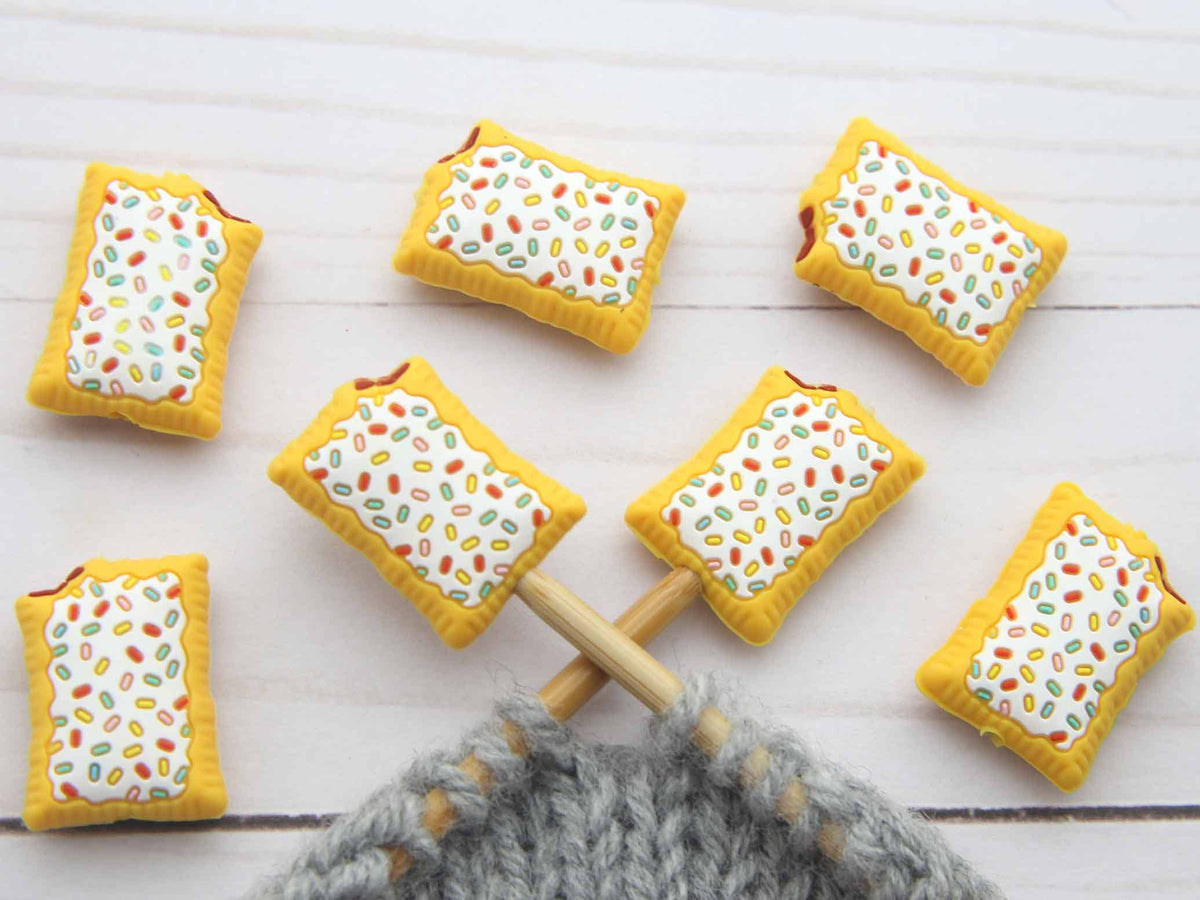 Toaster Pastries stitch stoppers on knitting needles
